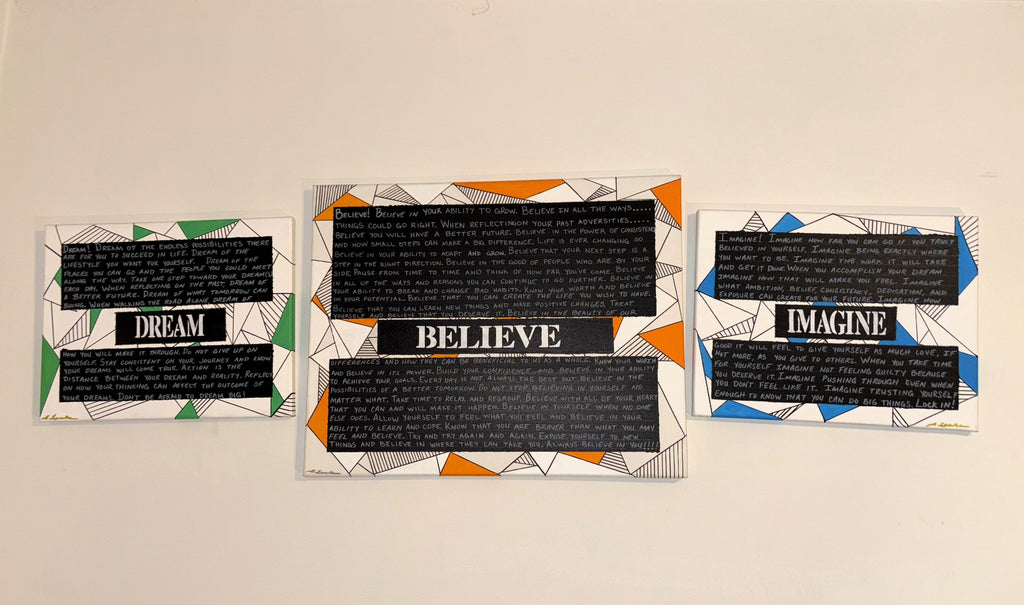 Three motivational wall art prints with black text panels and colorful geometric borders, displayed side-by-side on a plain off-white wall.