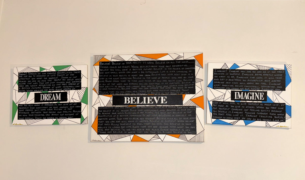Three motivational wall art prints with black text panels and colorful geometric borders, displayed side-by-side on a plain off-white wall.